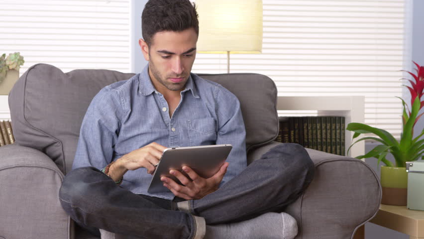 Patient reviewing clinic information on tablet through Practice Perfect platform.