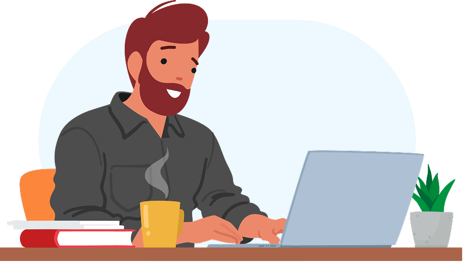 A man typing on a laptop.
